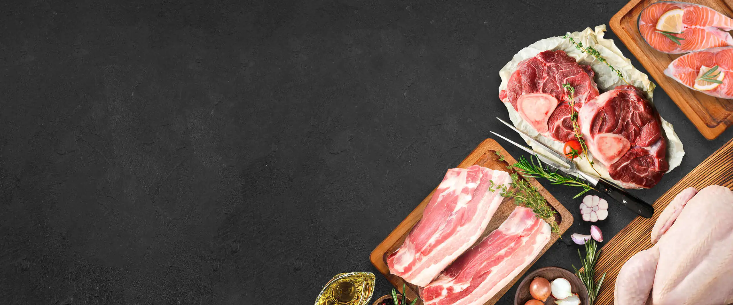 Butcher preparing a fresh cut at the NE Meats counter